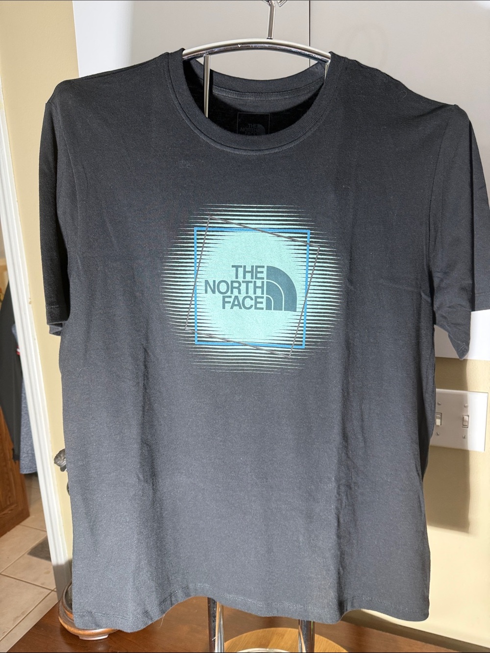 The North Face Black Tee with Teal Graphic